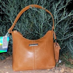 The purse I am selling has a little pocket of its own,the purse Is brand new